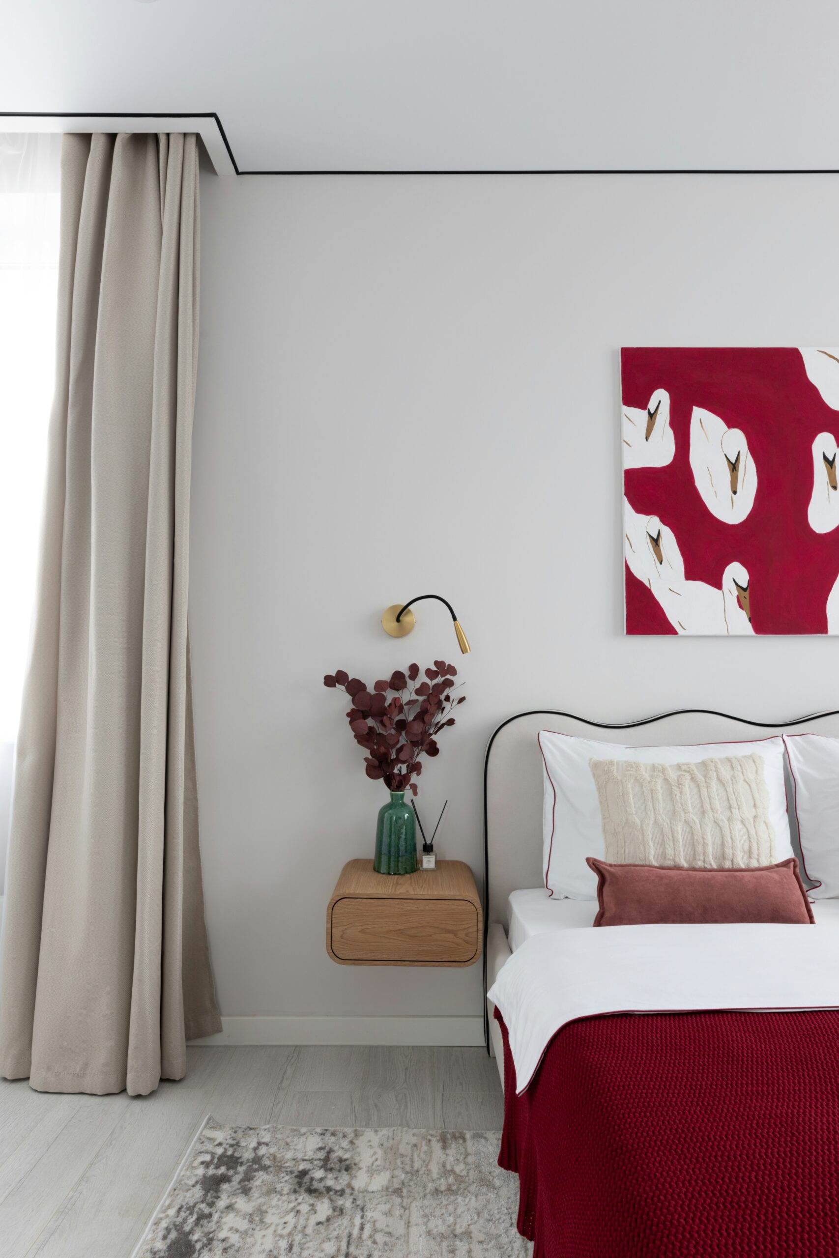 Cozy neutral bedroom with soft bedding, warm tones, and calm minimal styling.