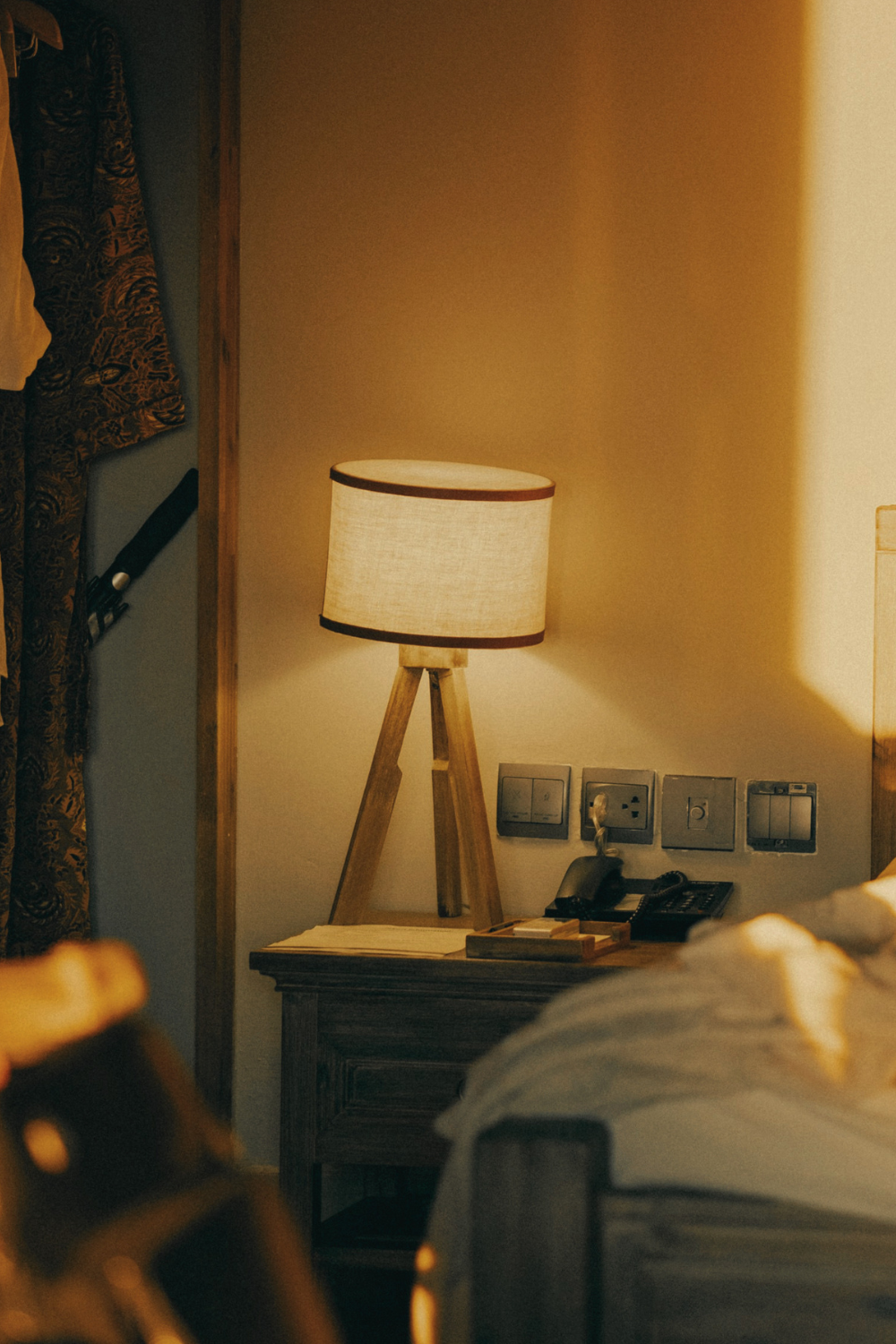 Soft ambient lighting in a Japandi bedroom creating a warm and restful mood.
