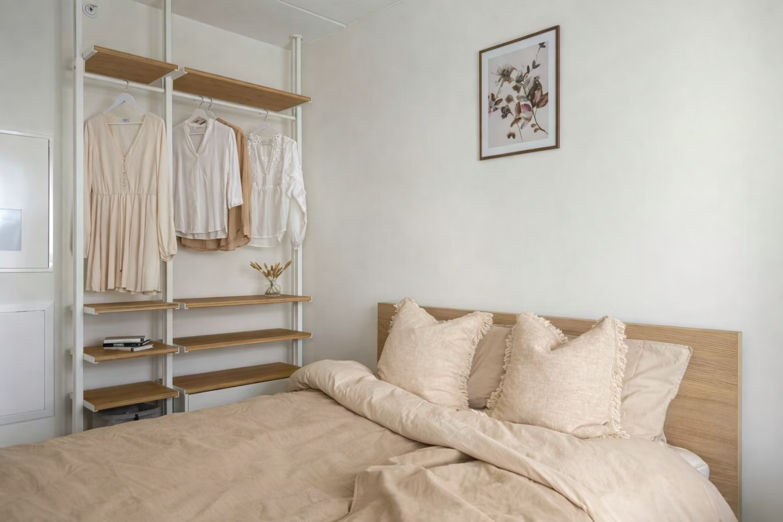 Soft beige Japandi bedroom with warm neutral tones, light wood furniture, and a calm minimal atmosphere.