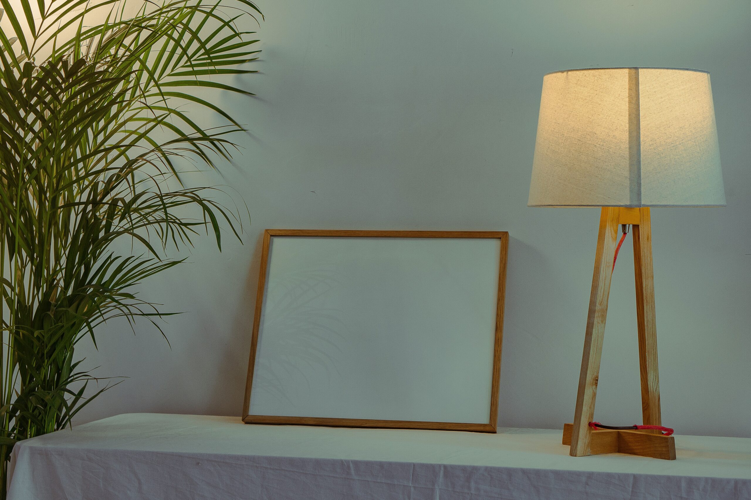 Simple bedroom decor with a few intentional objects arranged in a calm and minimal way.
