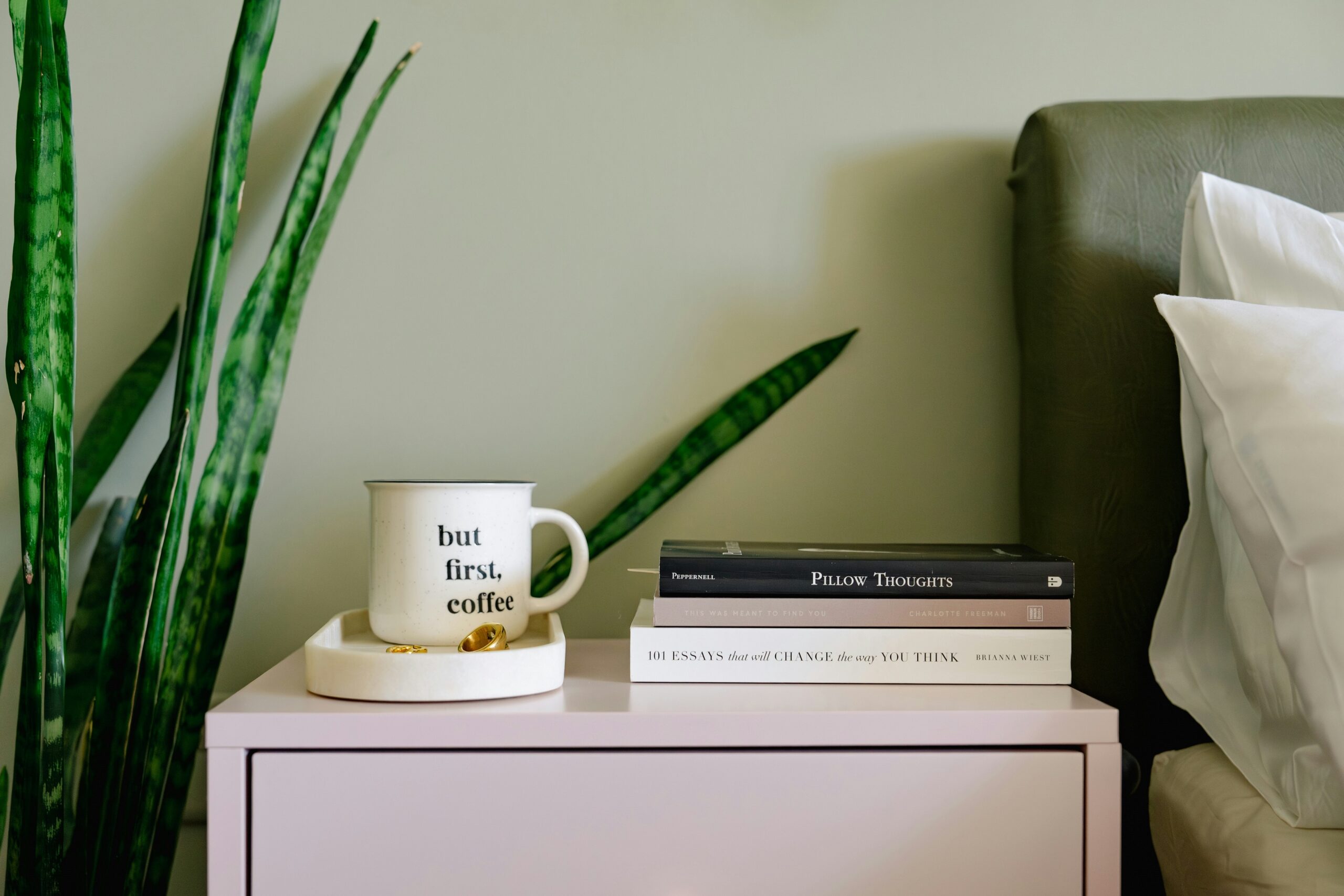 Bedroom with natural materials like wood, linen, and soft neutral textures creating warmth and depth.